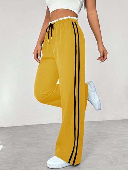Pantaloni jogging da donna comodi con strisce laterali - Pantaloni sportivi e casual dal taglio morbido