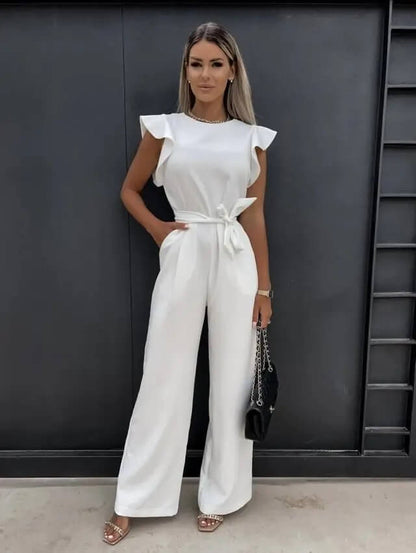 Noélia - Maxi-Overall in satin con maniche corte, spalle ondulate, colletto alto, cintura e gamba ampia