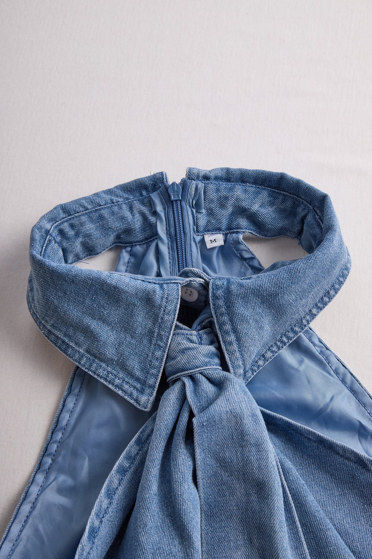 Clémence - Blusa senza maniche con colletto a halter e dettaglio nodo per donne