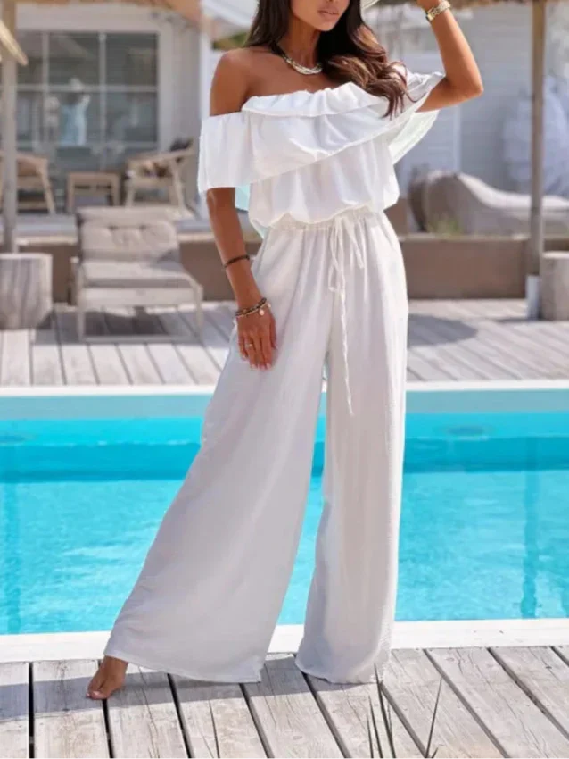 Capucielle - Combinazione elegante per donne con spalline scoperte, volant e gamba larga