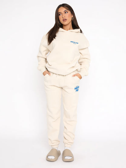 Oréline - Set Elegante a Due Pezzi: Felpa con Cappuccio e Pantaloni Sportivi a Vita Alta in Colori Tenui