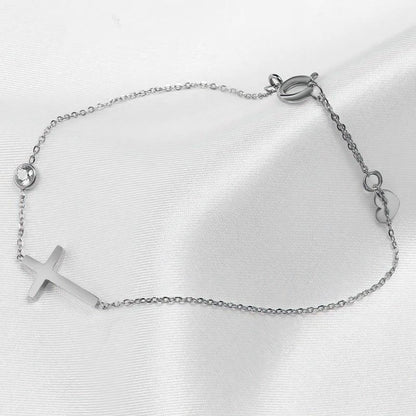 Bracciale elegante con pendente a croce e zirconia – Gioielli raffinati per donne